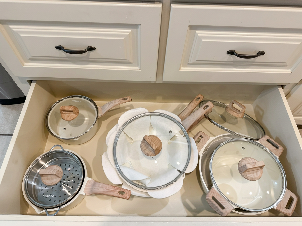 Drawer stocked with pots, pans and cookware