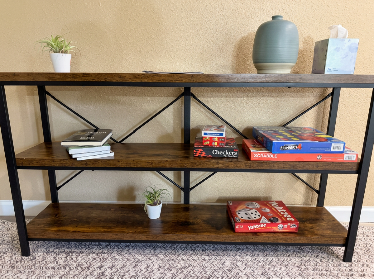 Console shelf stocked with board games and books
